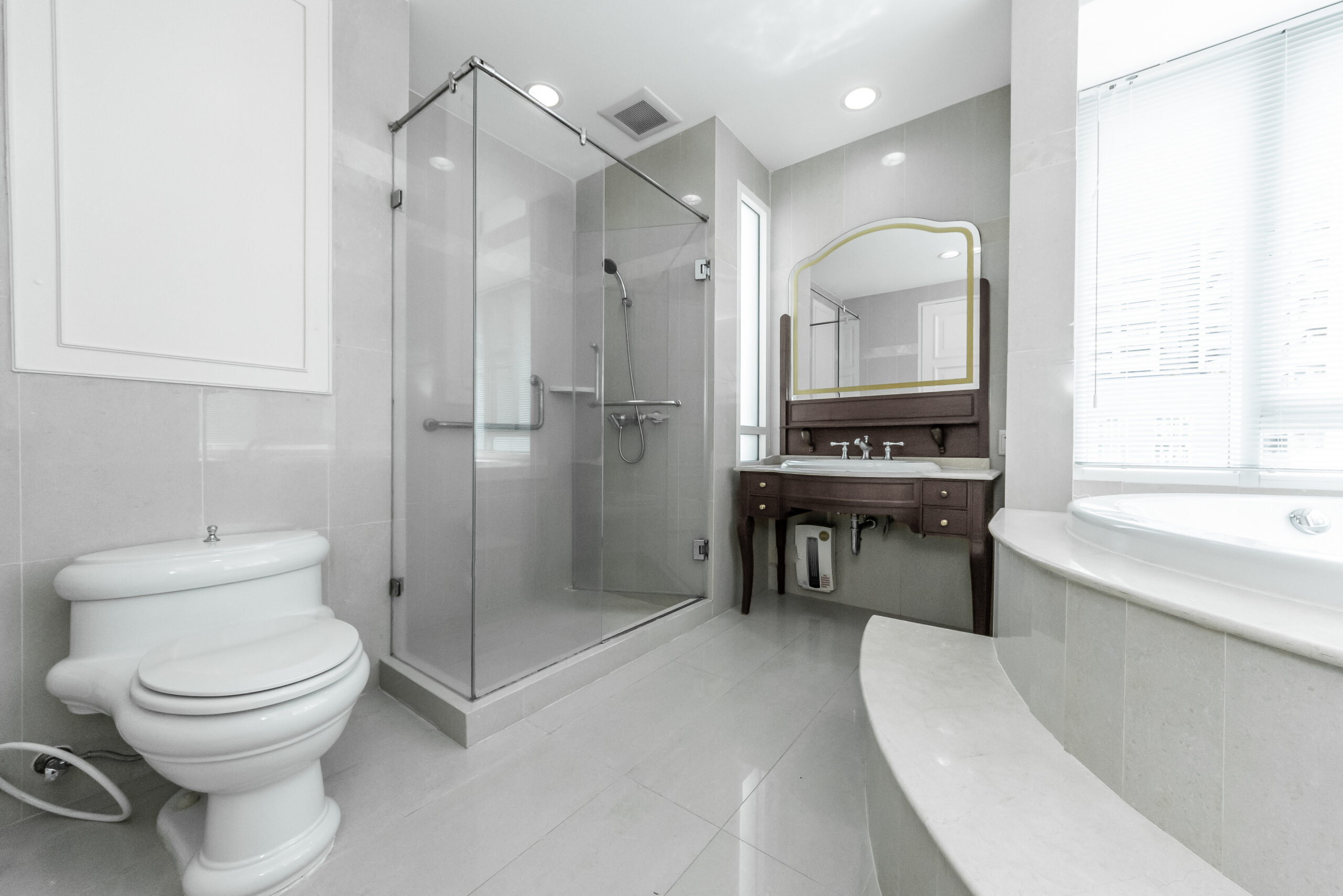Bath remodel featuring a new walk-in shower and a jacuzzi bathtub