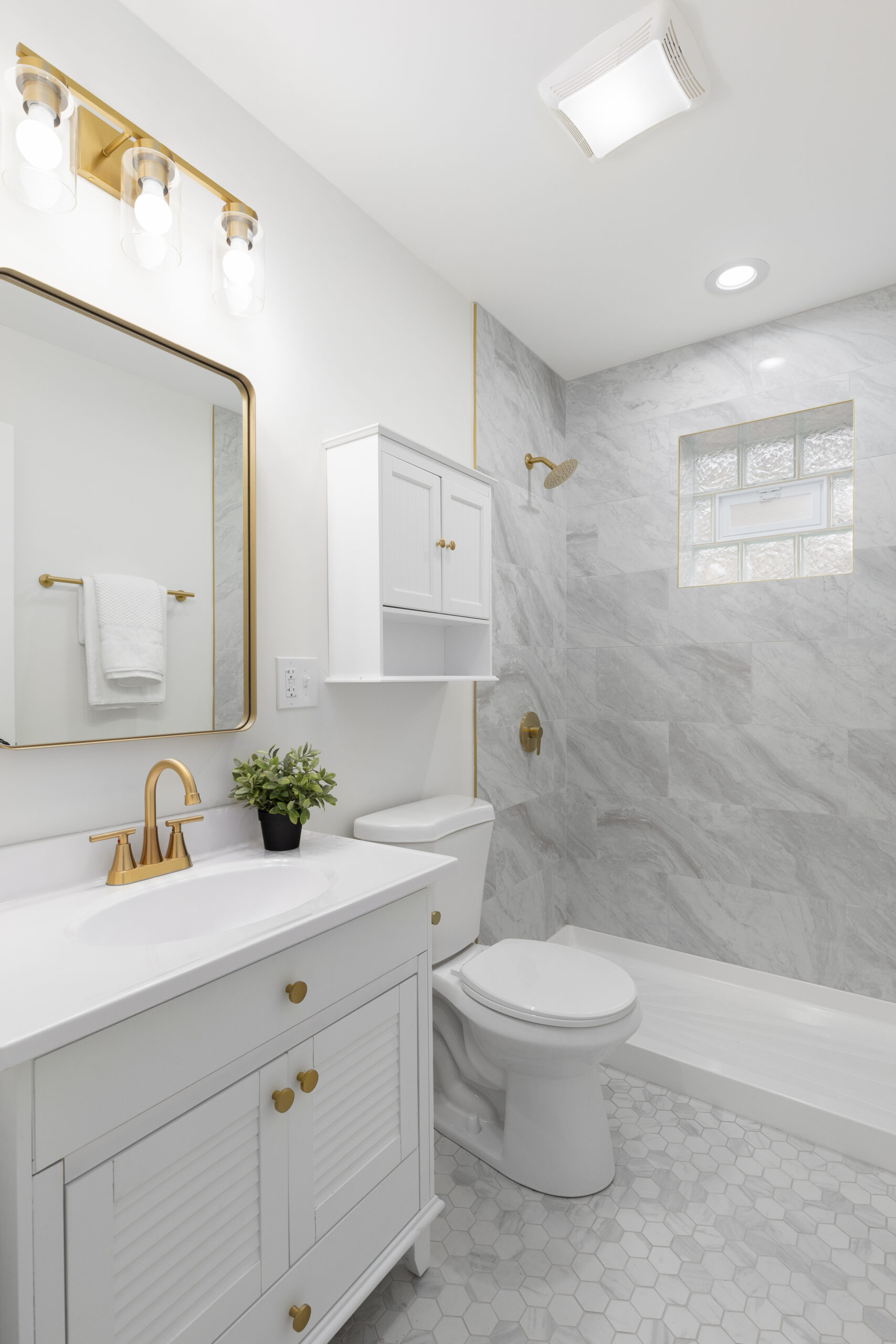 Sleek shower insert with modern fixtures