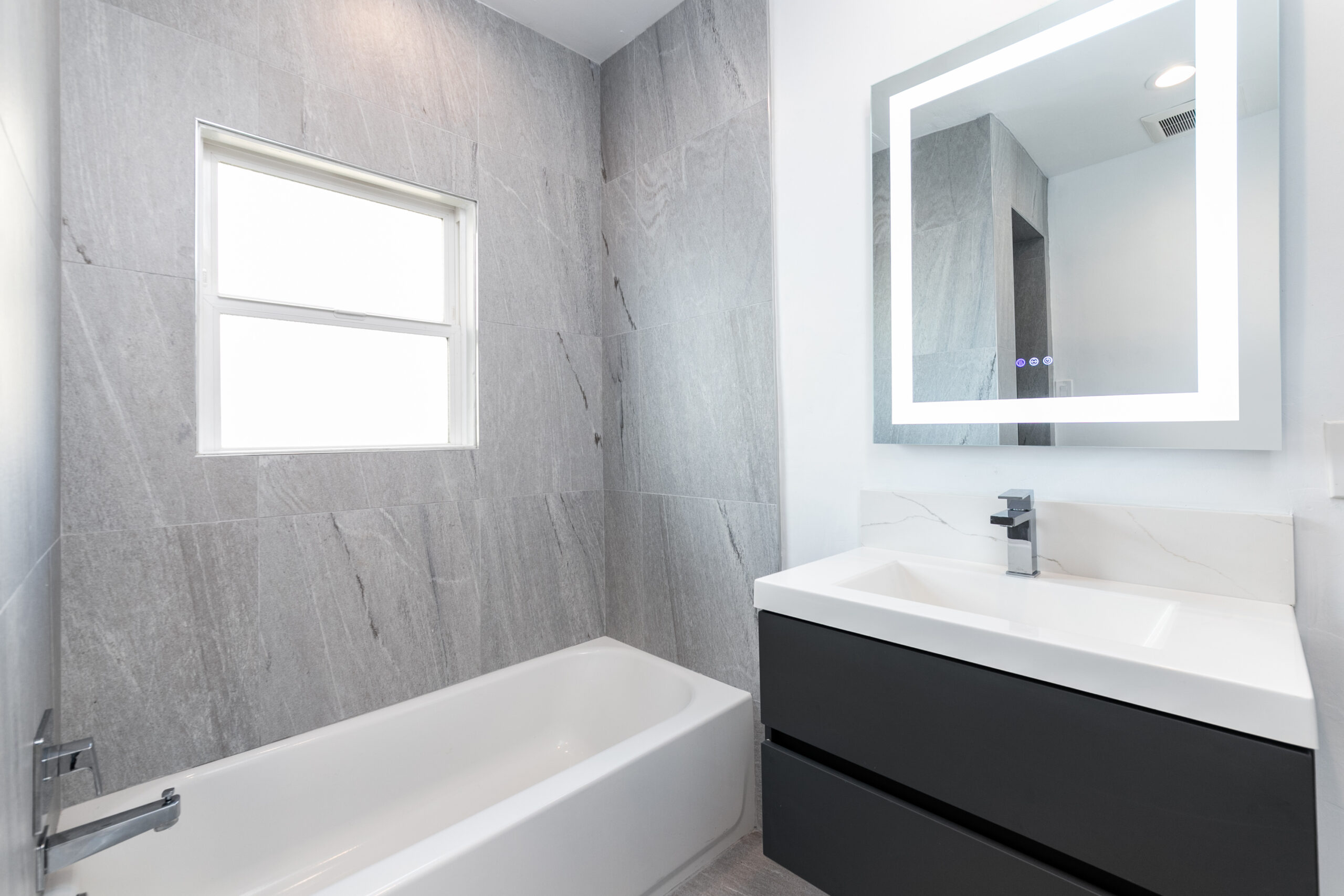 New prefab bathtub with modern fixtures